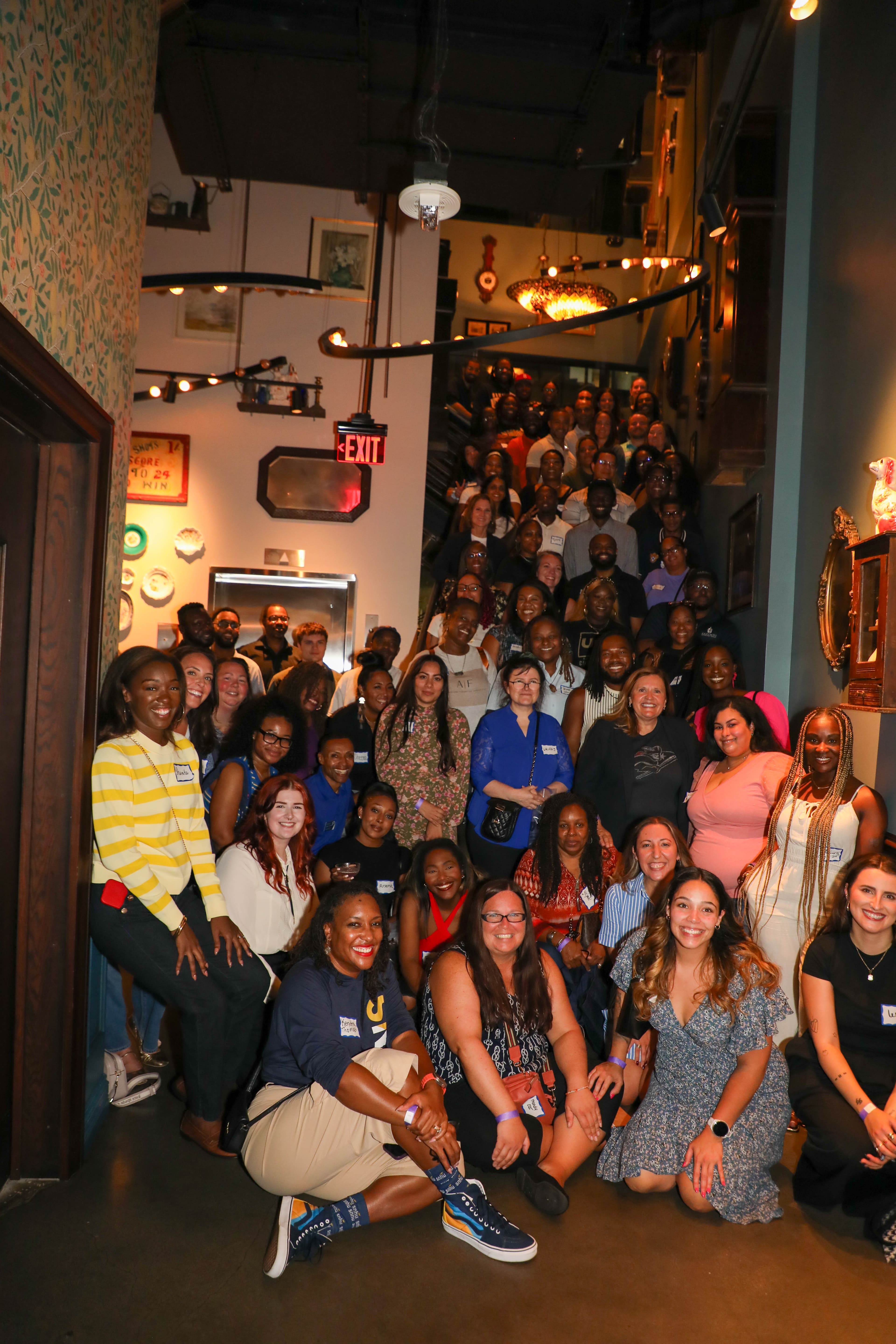 Large group of SNHU alumni at a networking event