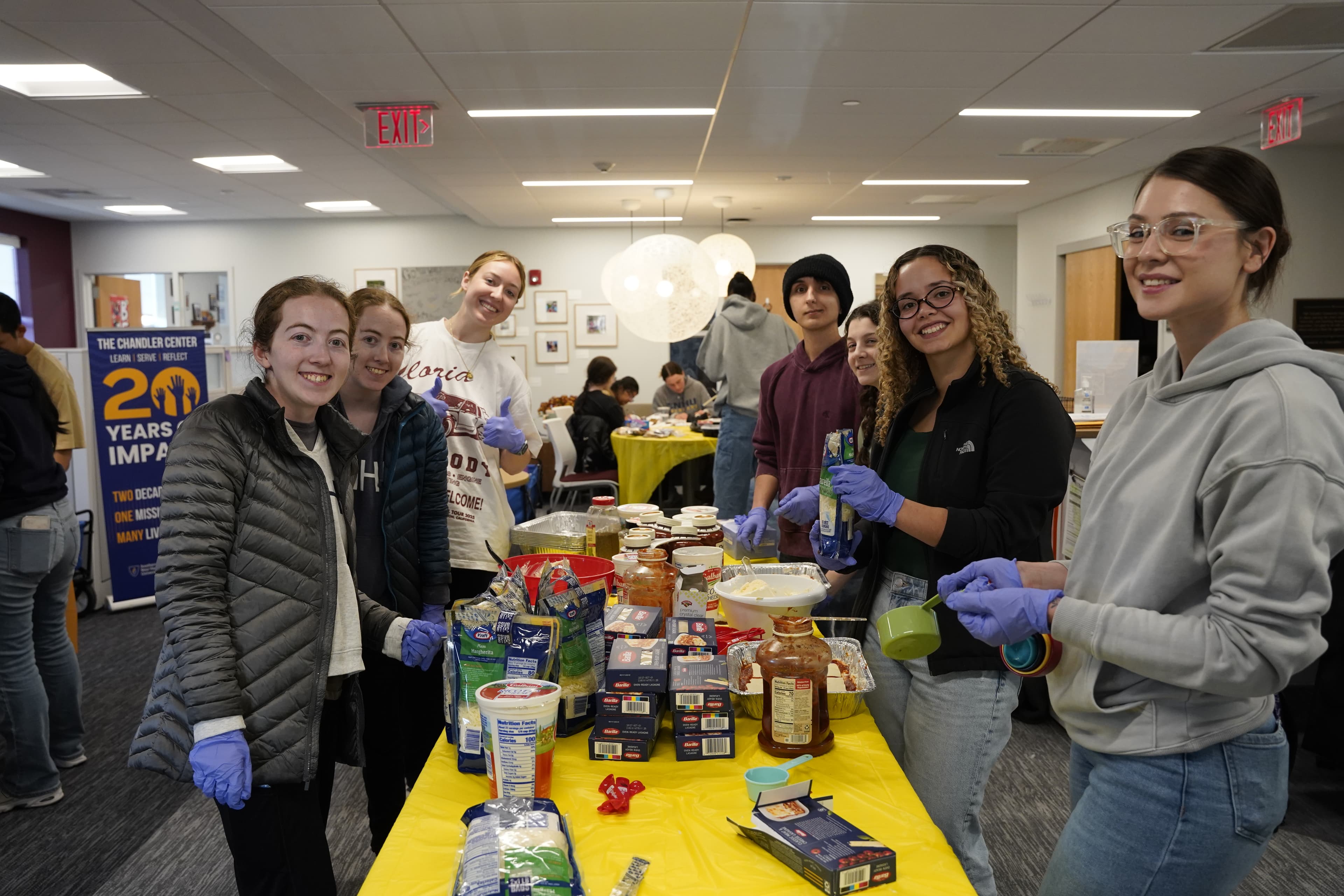 SNHU alumni volunteering at a community food drive